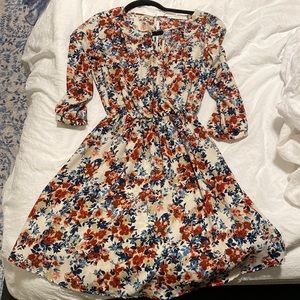Worn twice long sleeve floral mini-dress